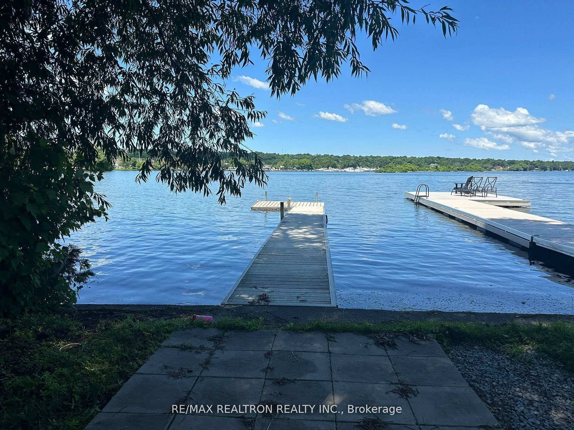 Beautifully Renovated 3 Bedroom 2 Bath Waterfront Home in Downtown Orillia Fully Furnished, Enjoy lakeside living in this fully detached, 3 bedroom home with stunning views of Lake Couchiching.
