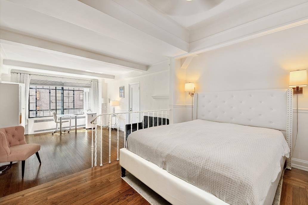 Beautifully renovated studio with sleeping balcony and separate dressing room, in a wonderful pre war building in the heart of the City, Apartment features City Windows for extra quiet, beamed ...