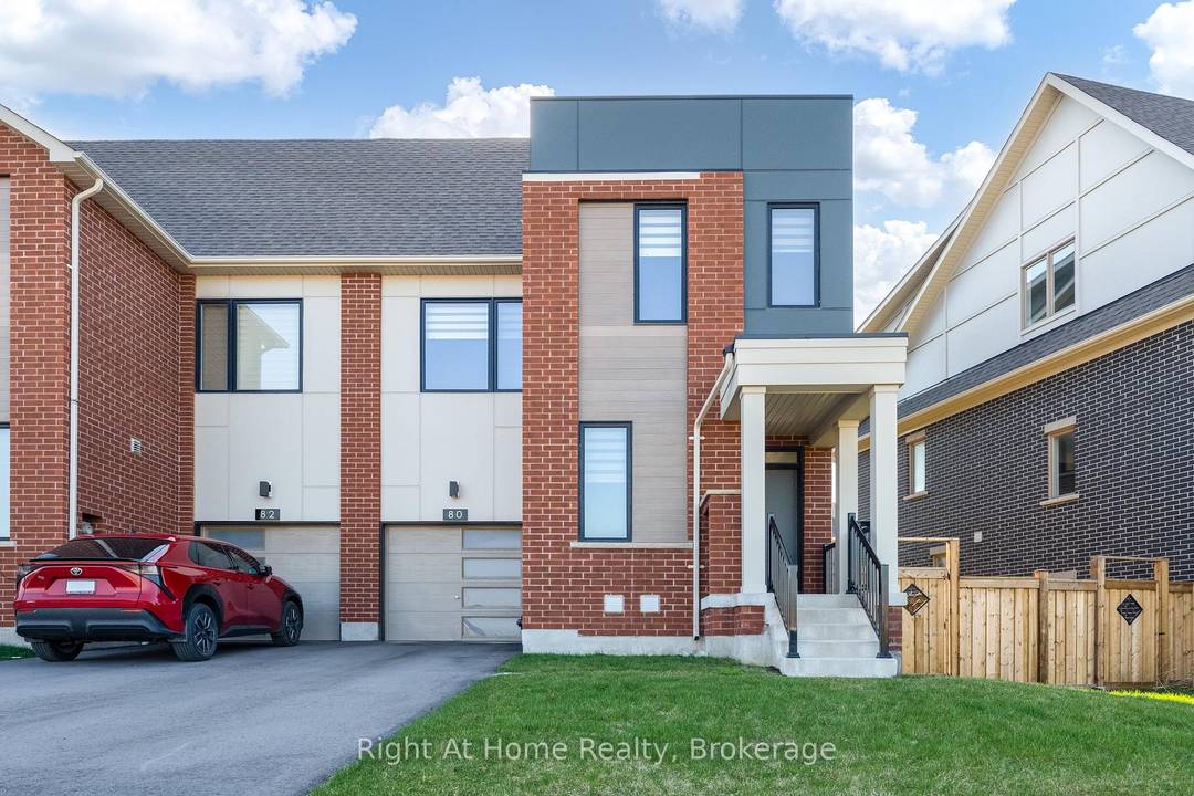 Welcome to this luxurious and spotless End Unit freehold townhome in a prime Oakville location across the park.