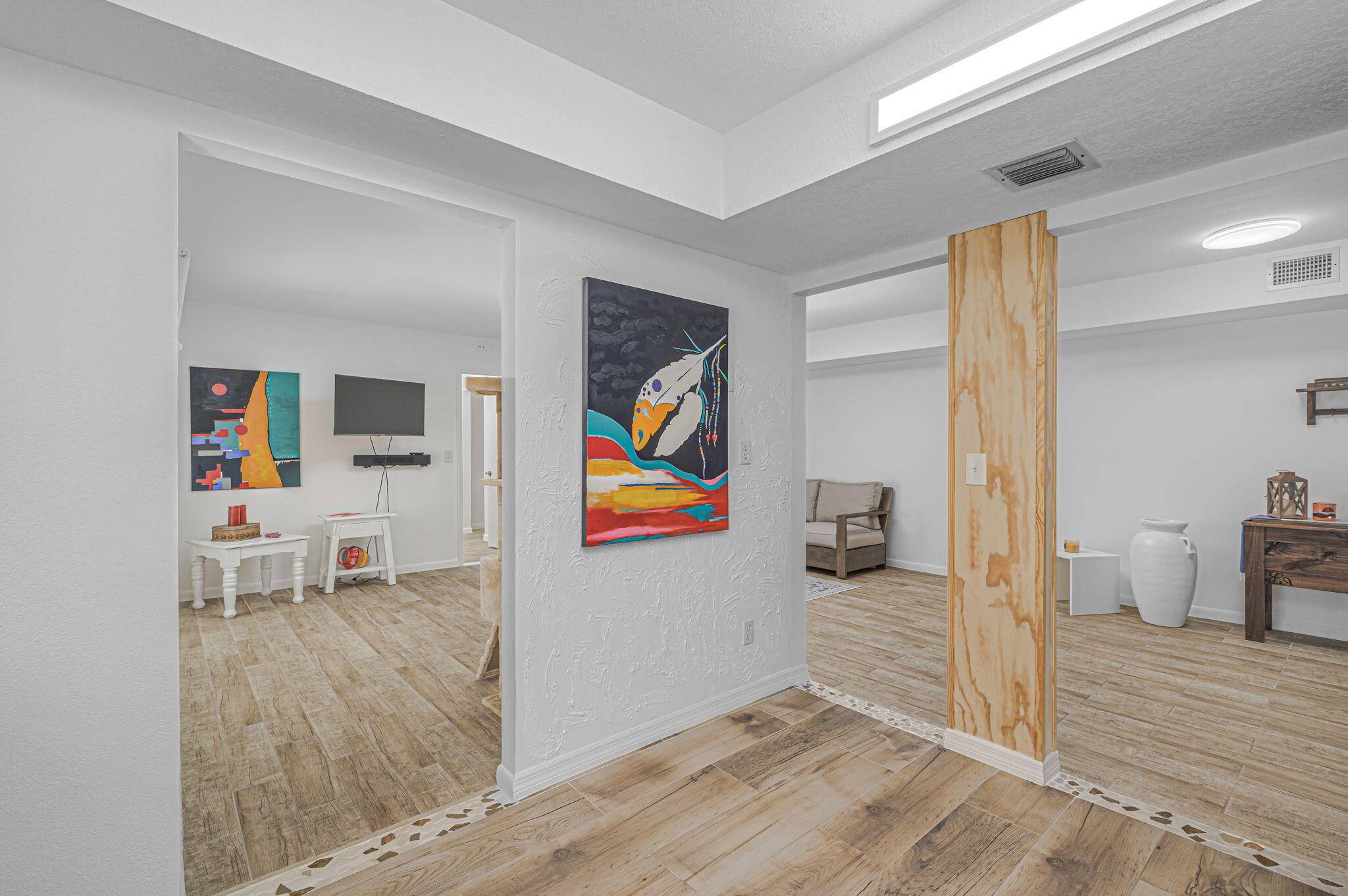 This first floor corner unit has been masterfully redesigned with style and utility in mind.