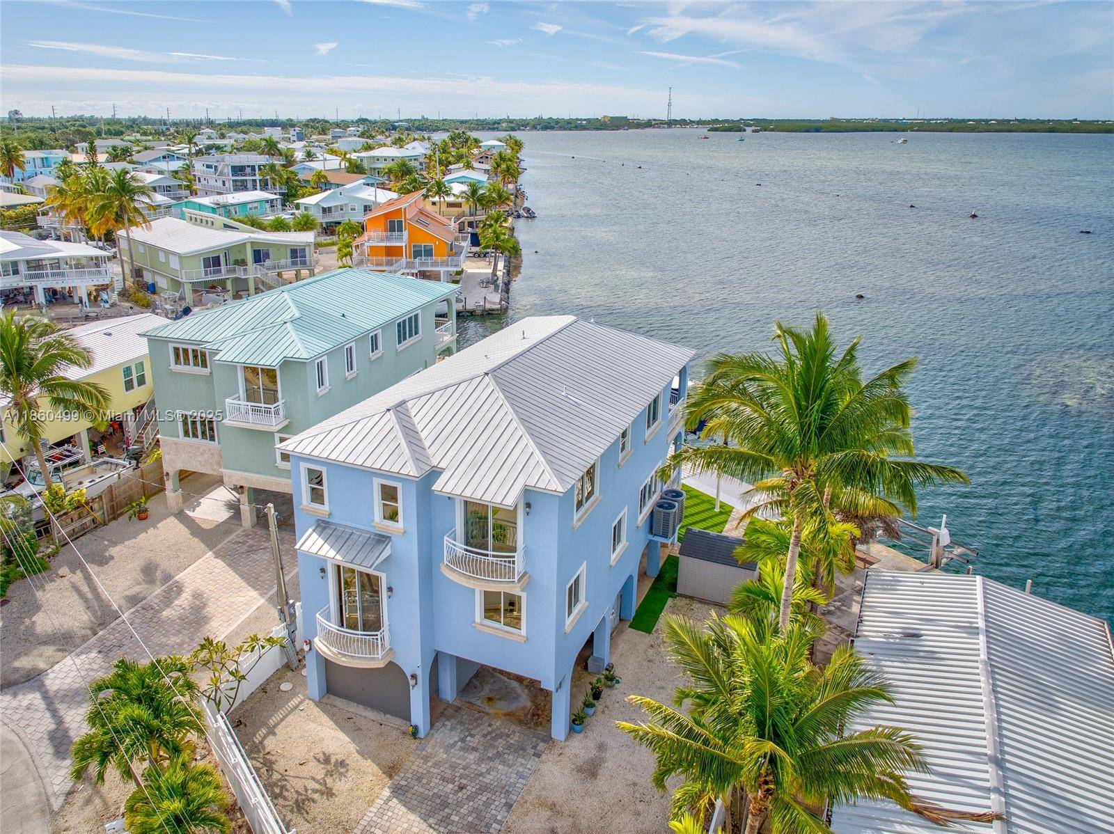 Waterfront luxury in the heart of the Florida Keys, where breathtaking sunsets paint the sky from your own backyard paradise.
