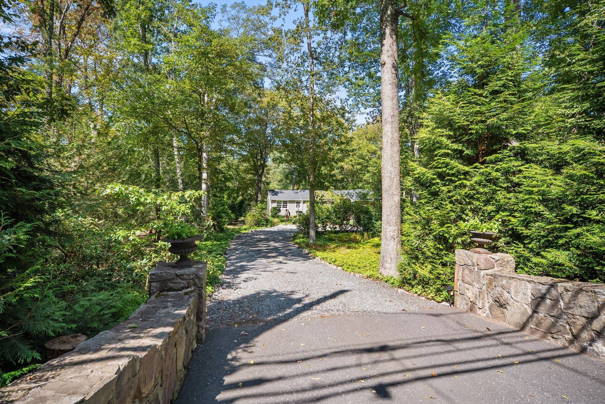 High Above the Aspetuck River, a Home That Knows How to Keep a Secret.