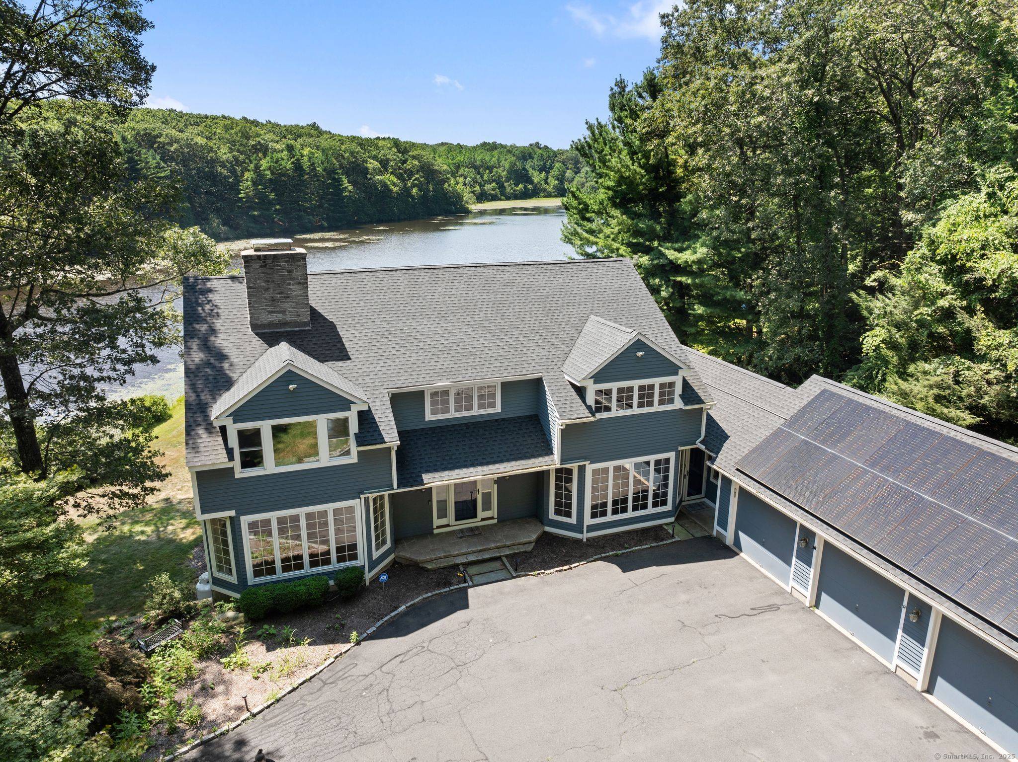 Spectacular waterfront home with breathtaking views of Stepanski Pond !