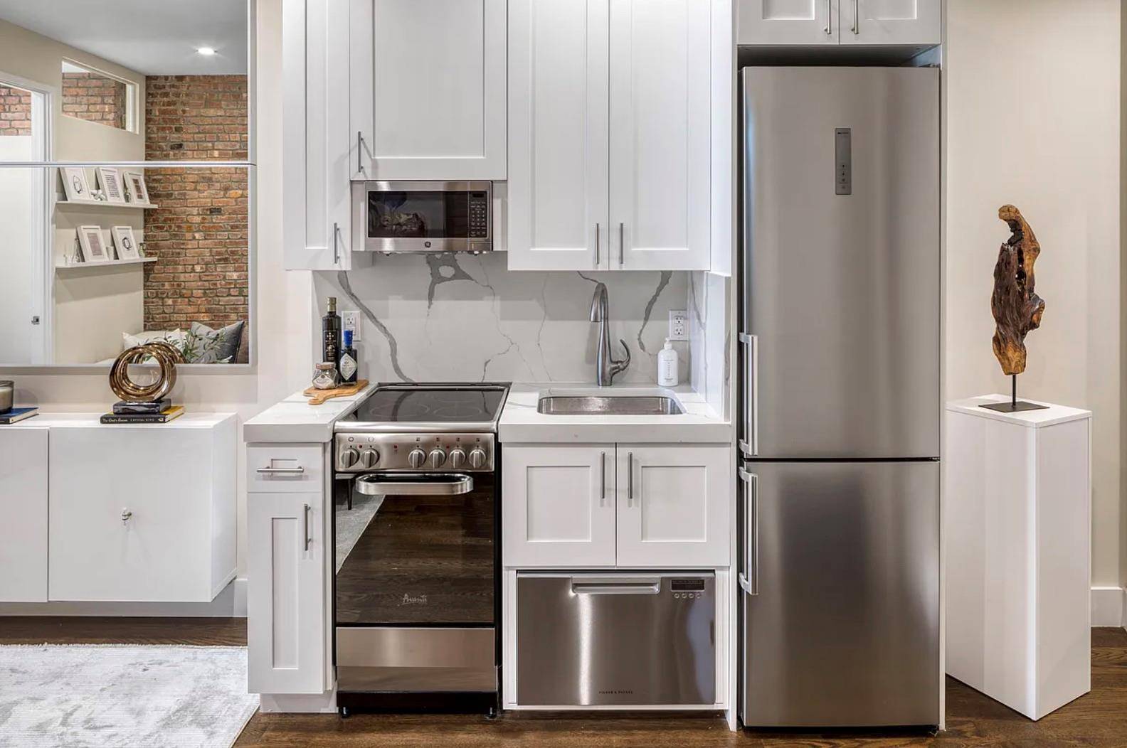 AVAILABLE AUGUST 1STOPEN HOUSE IS BY APPOINTMENTThis gorgeous 3BR apartment, which has undergone a stunning gut renovation, boasts an abundance of charm, such as exposed brick and hardwood floors.