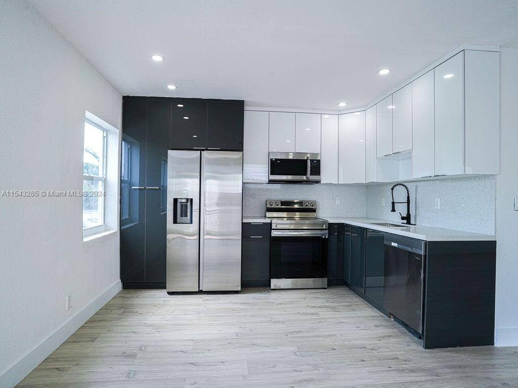 This beautiful SINGLE FAMILY 3 bedroom, 2 bath, new roof, hurricane impact windows, has open floor plan with a kitchen, beautiful countertops, stainless steel appliances, pantry and laundry, vinyl flooring.