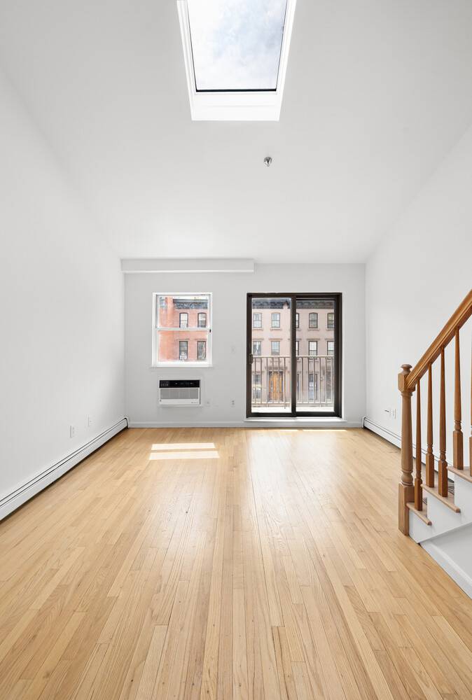 Welcome to this expansive, sun drenched duplex that offers a rare combination of modern interior design and massive private outdoor living.