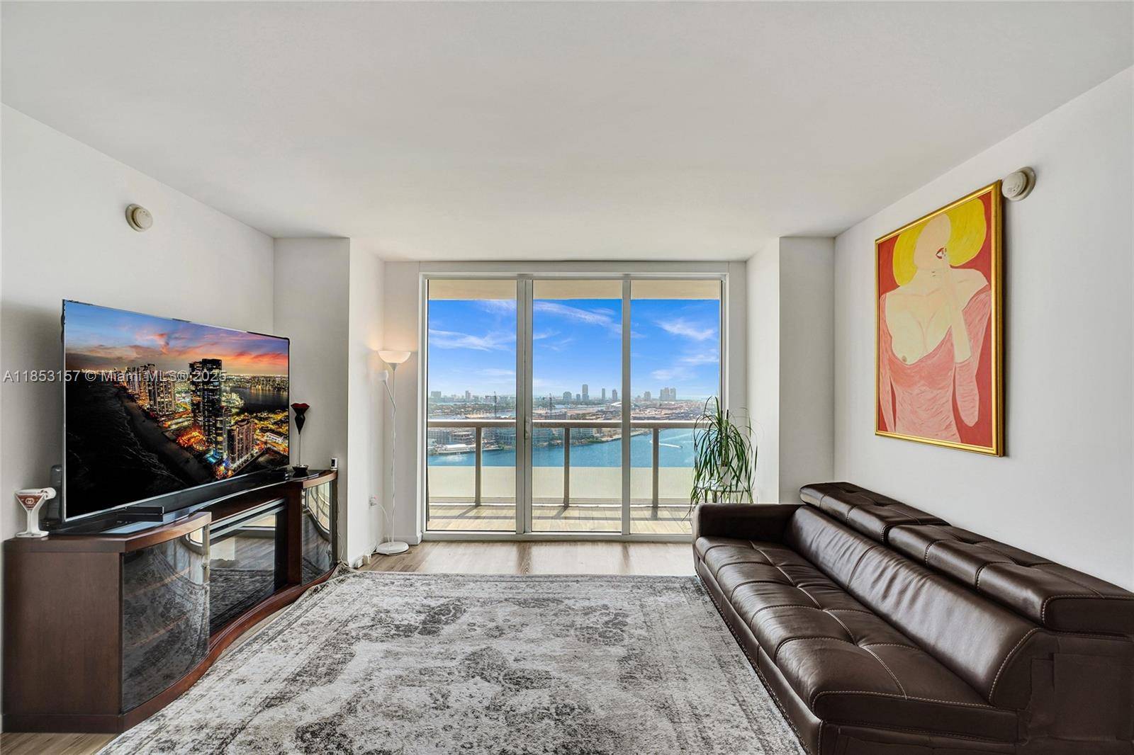 Soak in stunning direct bay, port, and city light views including Bayfront Park s music fountain and even the Ultra Music Festival from every room of this updated 2 bed, ...