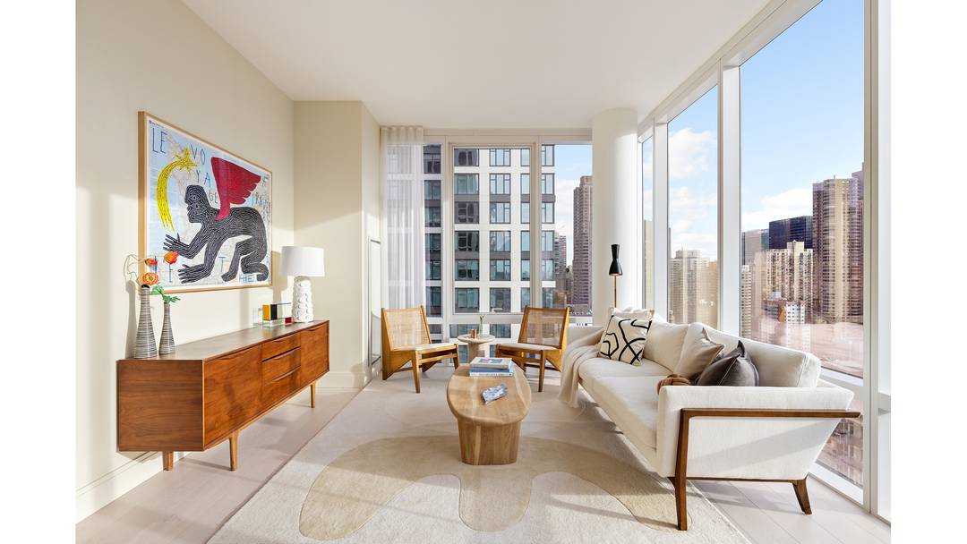 Oversized One Bedroom with a Den and Wrap Around Terrace Residences Feature Bosch in residence washer and dryer 7 white oak plank flooring Deluxe white marble kitchen countertops Premium Miele ...