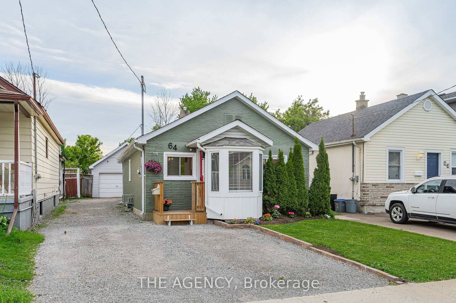 Welcome to 64 Churchill Street, a beautifully updated bungalow tucked into a quiet pocket of St.