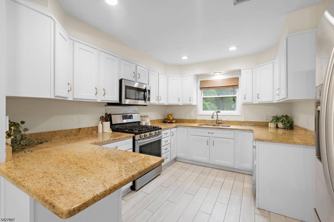 Welcome to this light filled Colonial offering space, comfort, and an unbeatable Ridgewood location !