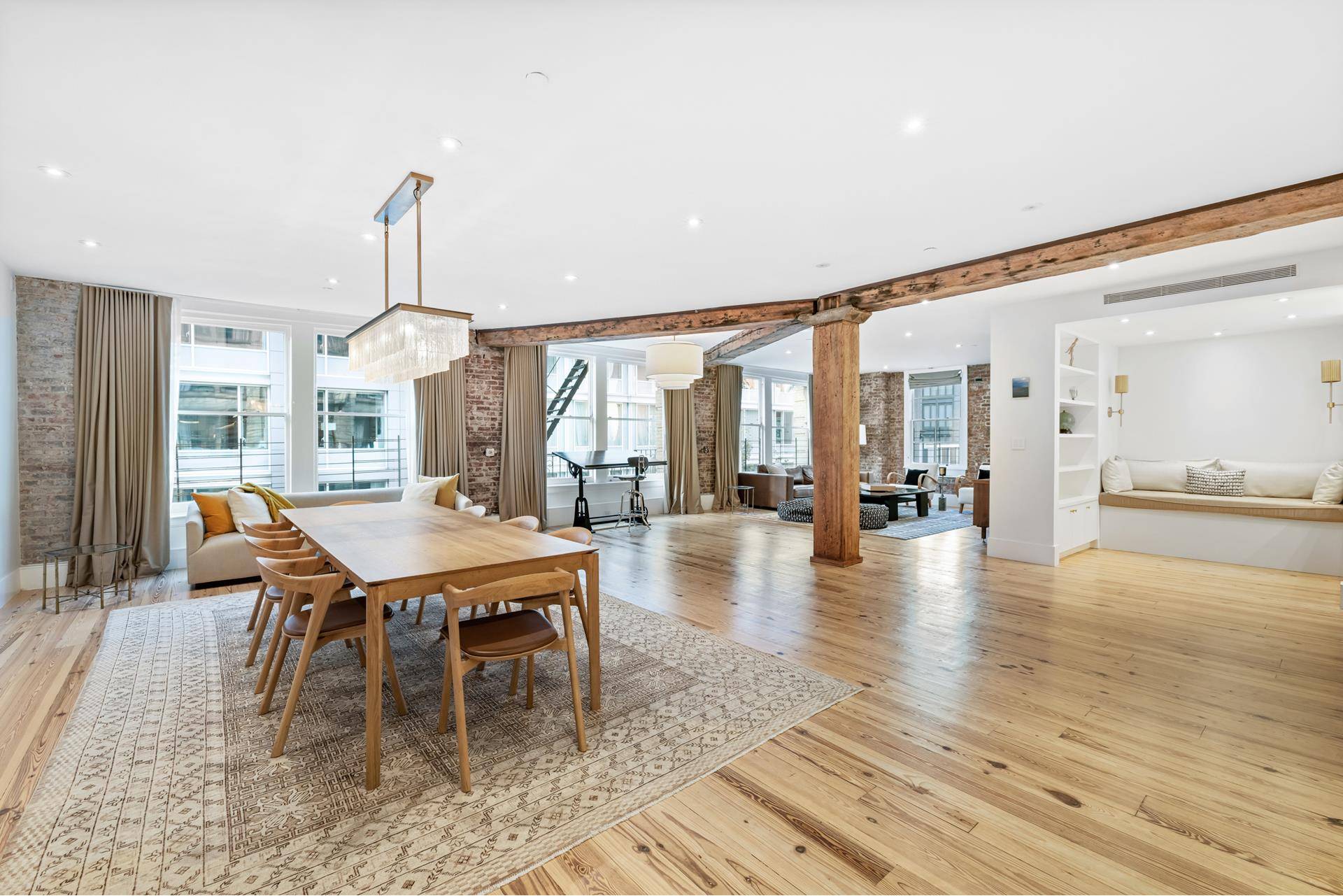 Rare quintessential SoHo loft overlooking iconic cobblestoned Wooster Street.