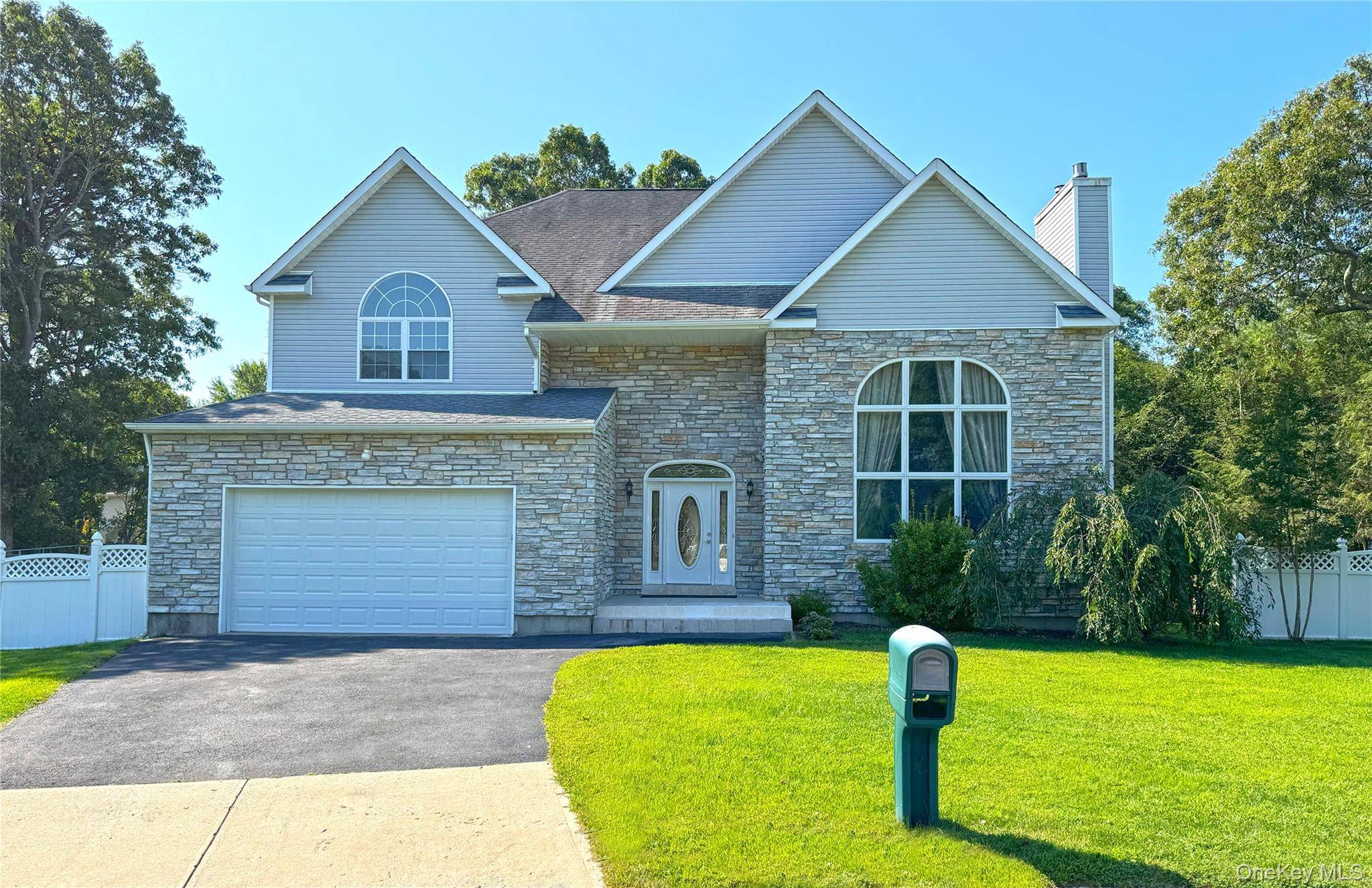 Welcome home to this young and spacious contemporary colonial, nestled on a 0.