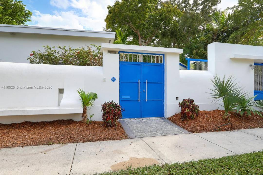 Walled amp ; gated home in the exclusive Bay Heights neighborhood of Coconut Grove.