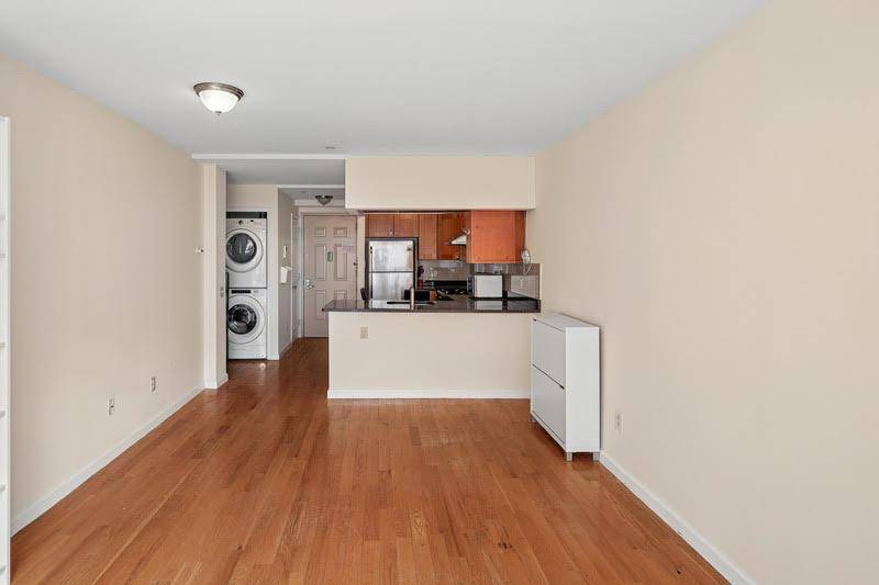 Welcome to Unit 6C at Woodside Terrace CondominiumsThis beautifully designed 2 bedroom, 2 bath residence with a private balcony is located in a prime Woodside location just a 7 minute ...