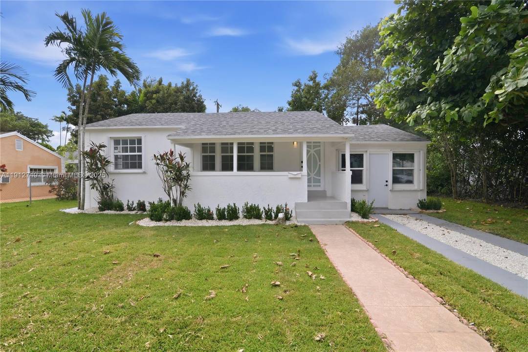 Brand New Roof 2025 ! FULLY RENOVATED 4 bedroom, 3 bath home features two master suites, each with its own full bath.