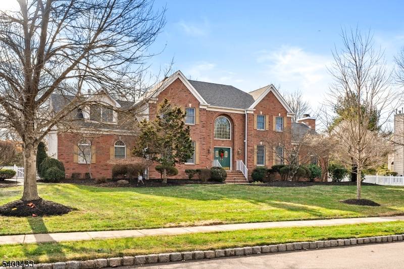Brick front Grand Colonial on beautiful Berkley Avenue in Belle Mead.