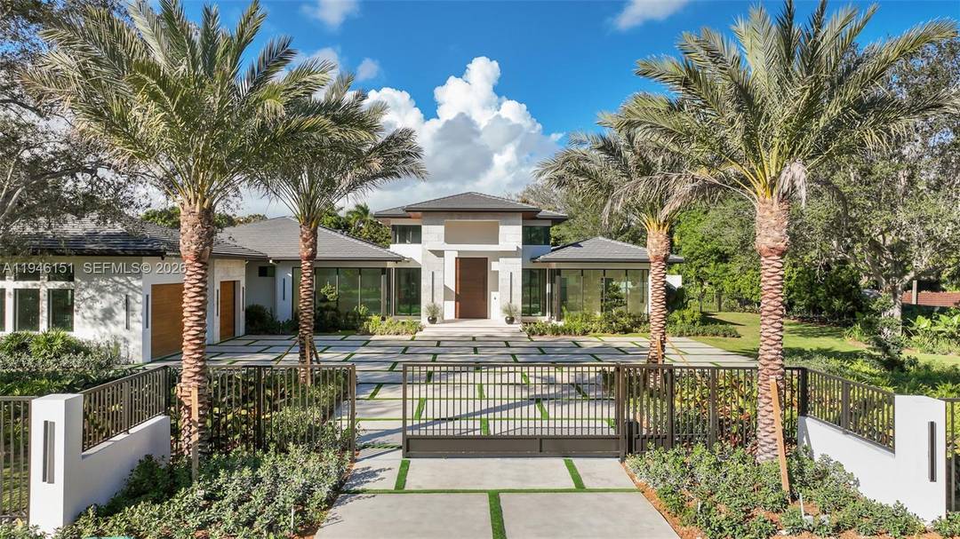 Exquisitely curated, privately gated, single level estate featuring 7 Bedrooms 8.