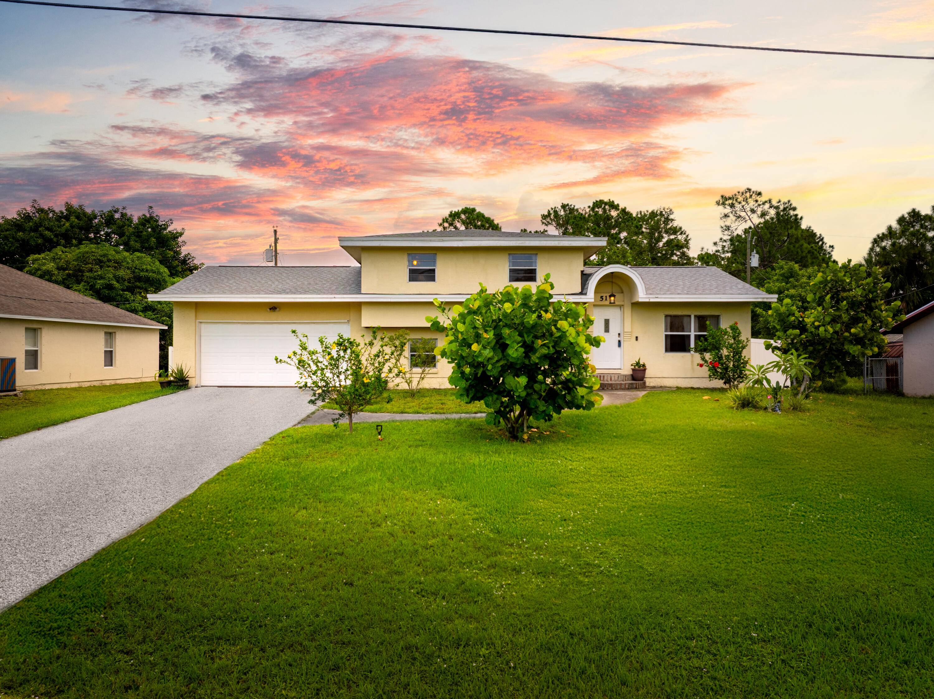 NEW ROOF ! ! Charming Updated Home with Income Potential in Port Saint Lucie No HOA !