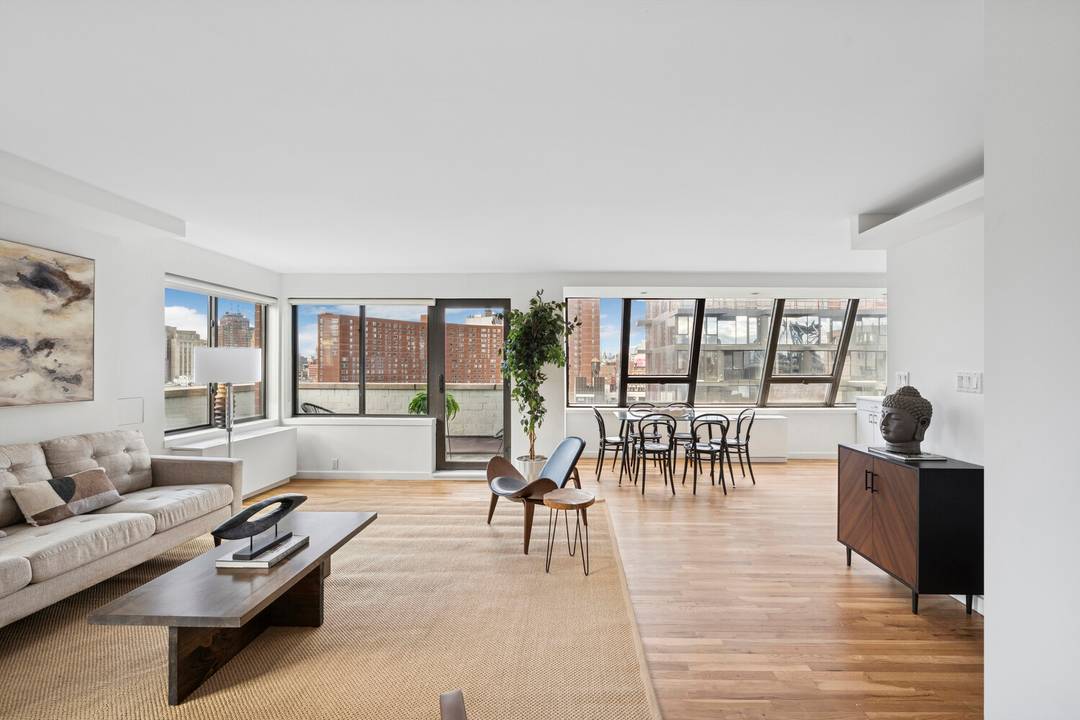 Perched high above the electric rhythm of the Lower East Side, this two bedroom penthouse loft is a luminous sanctuary in the sky.