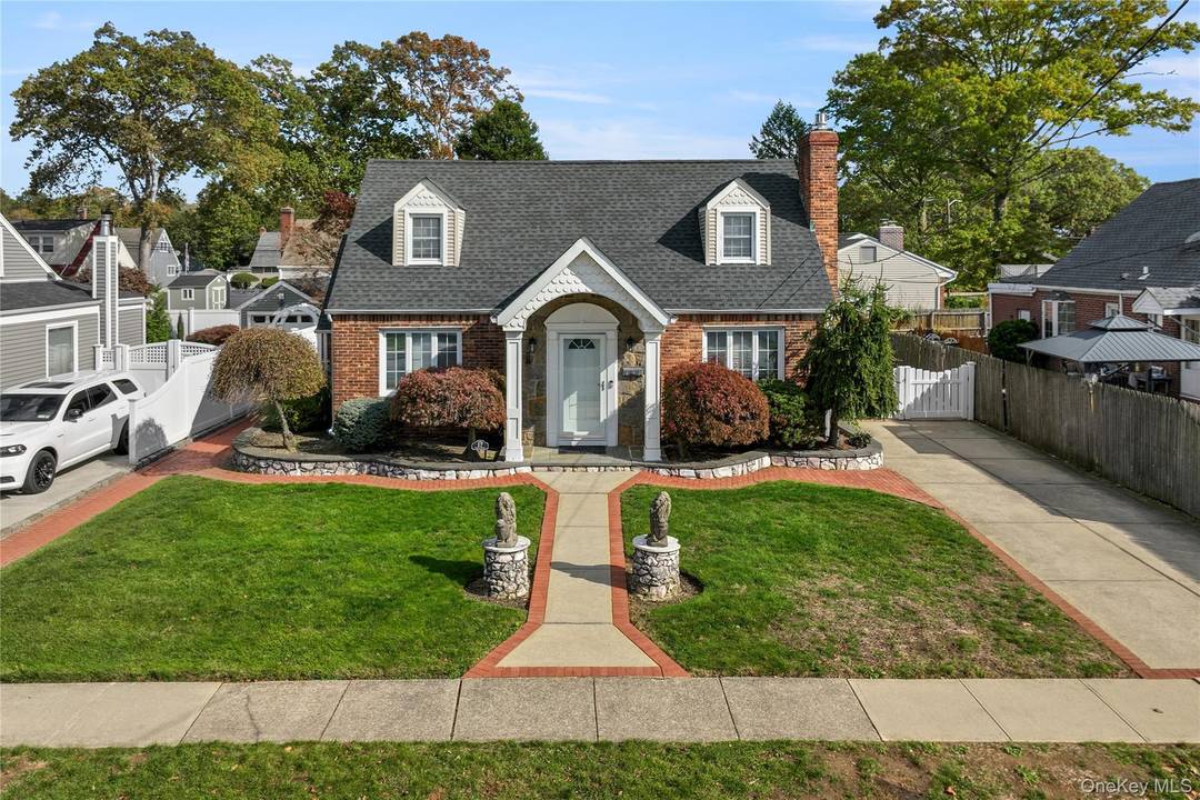 This Mid Block Completely Renovated 4 Bedroom, 2 Full Bathroom Home Was Designed For Family Comfort, Entry Foyer With French Doors Leading To A Large Sun Filled Living Room With ...