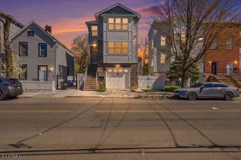 Home build 2023 like new 1st Fl garage, utility room, rec room, w half bath connection to apartment 1 with3 bedrooms living room, dining room, kitchen and 2 full baths ...