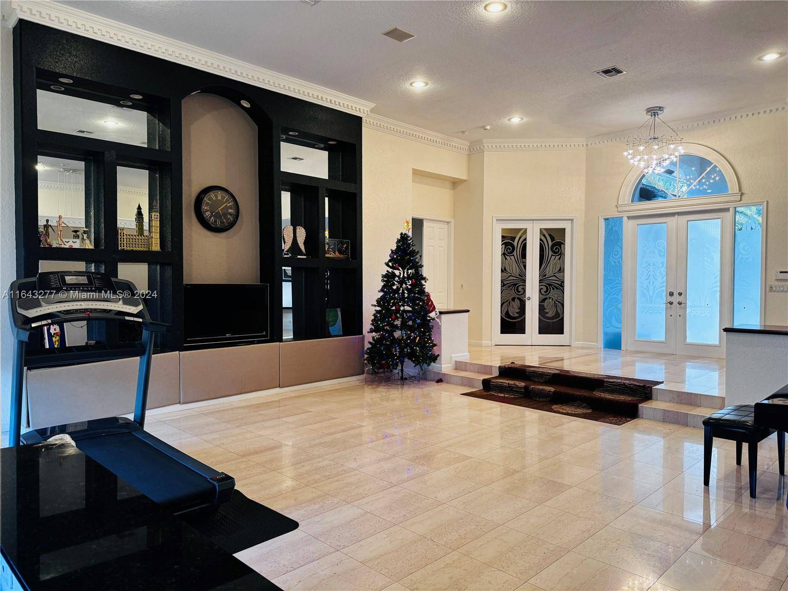 Premium 21, 778 sqft Corner Lot, 4, 389sqft living space Home featuring a beautifully designed circular driveway and an impressive grand foyer with soaring ceilings.