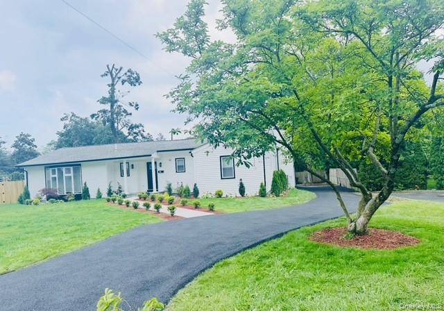 Step into this beautifully renovated 4 bedroom residence with 2.