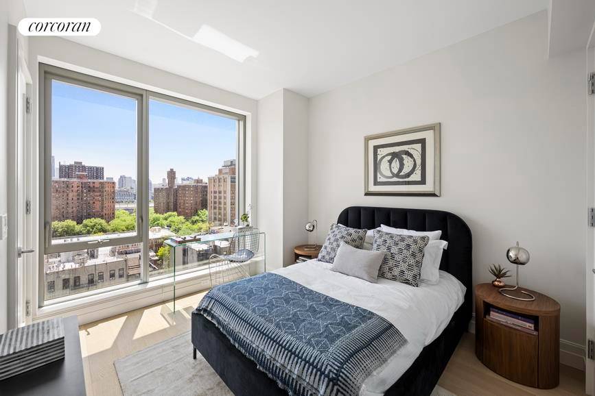 This light filled 564SF one bedroom has open views to the South East with massive windows which give way to picture perfect river views.