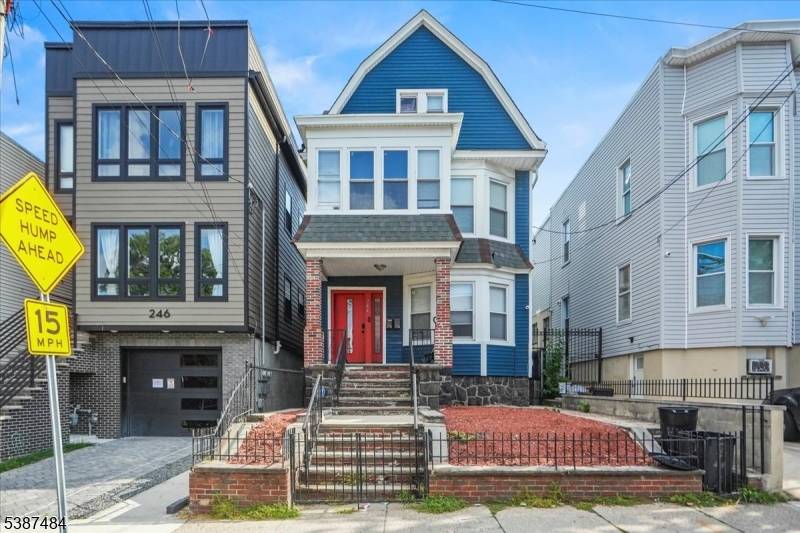Welcome to this modernized multi family home in Jersey City's West Side neighborhood, just steps from Lincoln Park.