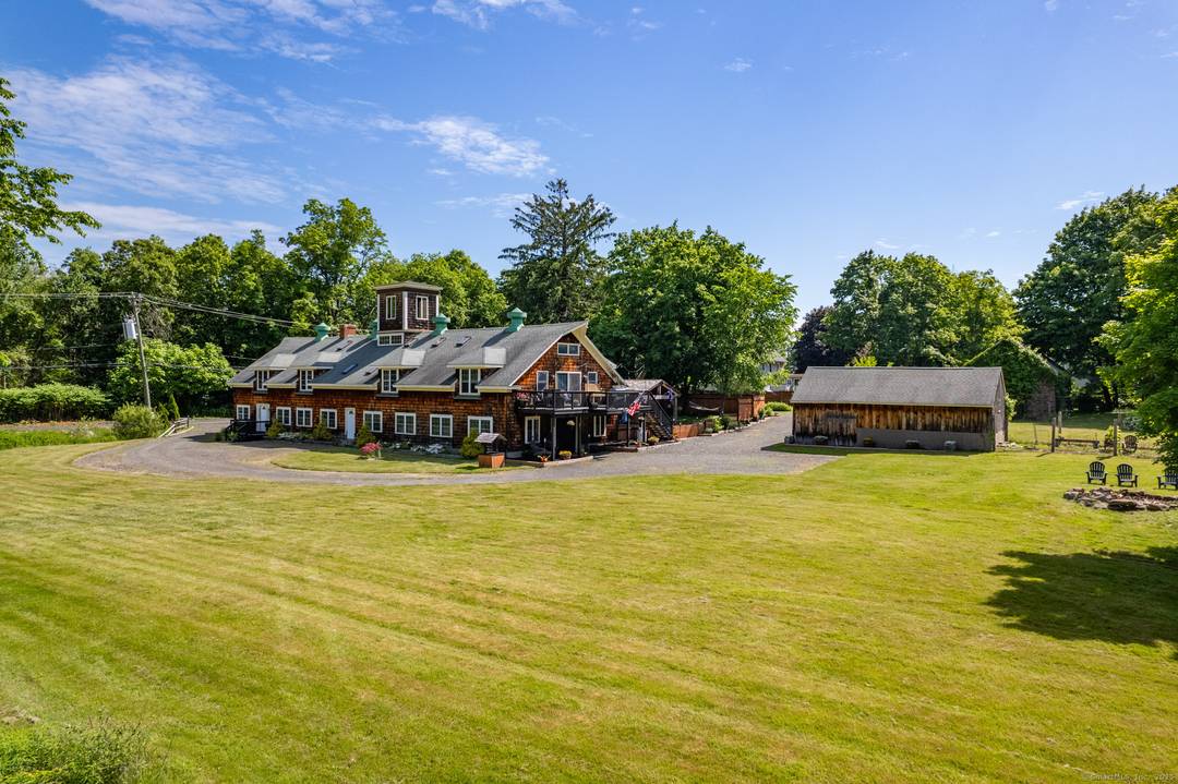 Welcome to your dream retreat nestled among lightly wooded surroundings with picturesque pond views !