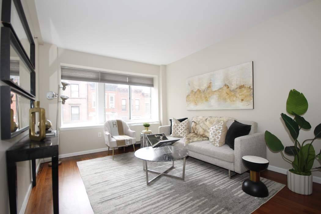 Huge, comfortable and unlike any full floor through townhouse you will ever see.