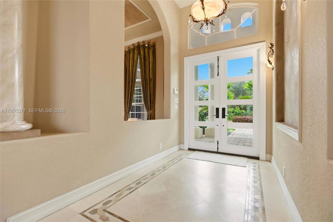 Located in the prestigious and sought after guard gated community of Stonebrook Estates.