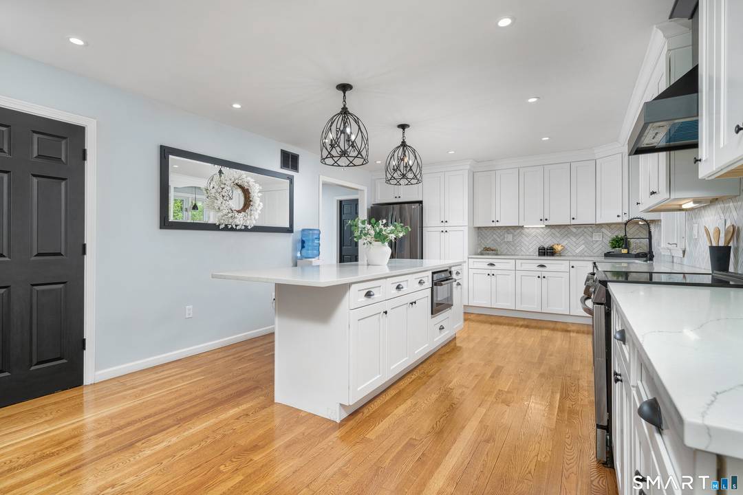 STUNNING 5 bedroom, 4. 5 bath Colonial set on almost 2 private acres in a peaceful cul de sac setting.