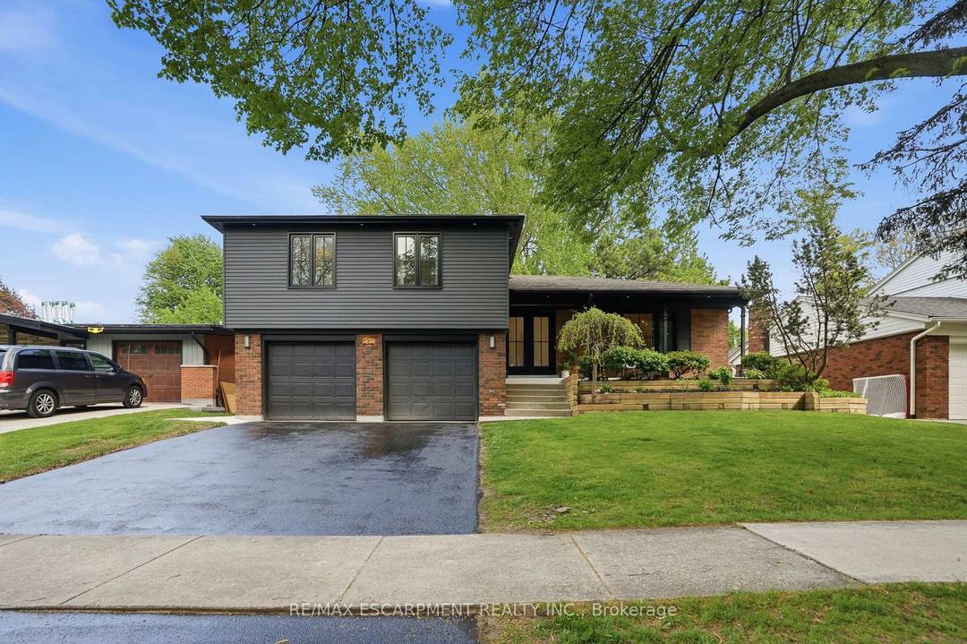 Welcome to 345 Rankin Drive, a truly exceptional custom residence located in the heart of prestigious Roseland.