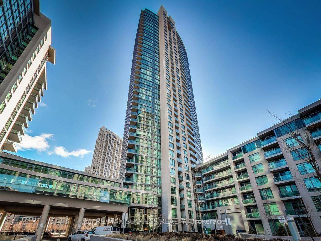 Experience luxury living with breathtaking CN Tower and lake view.