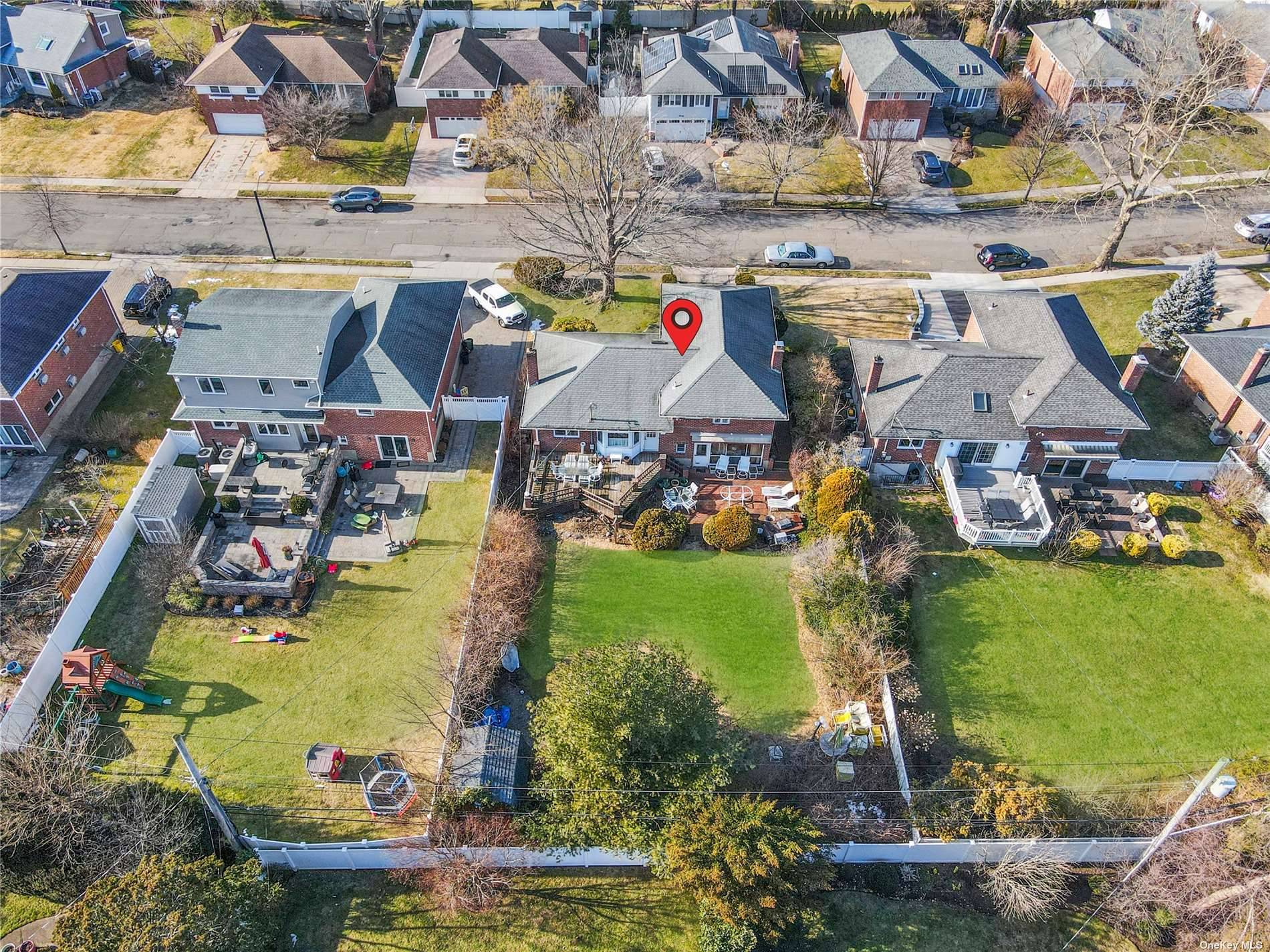 Property ! Location ! Quiet Mid block, centrally located Large 3 bedroom All Brick split on oversized 9100 sq ft lot with 2 car garage !