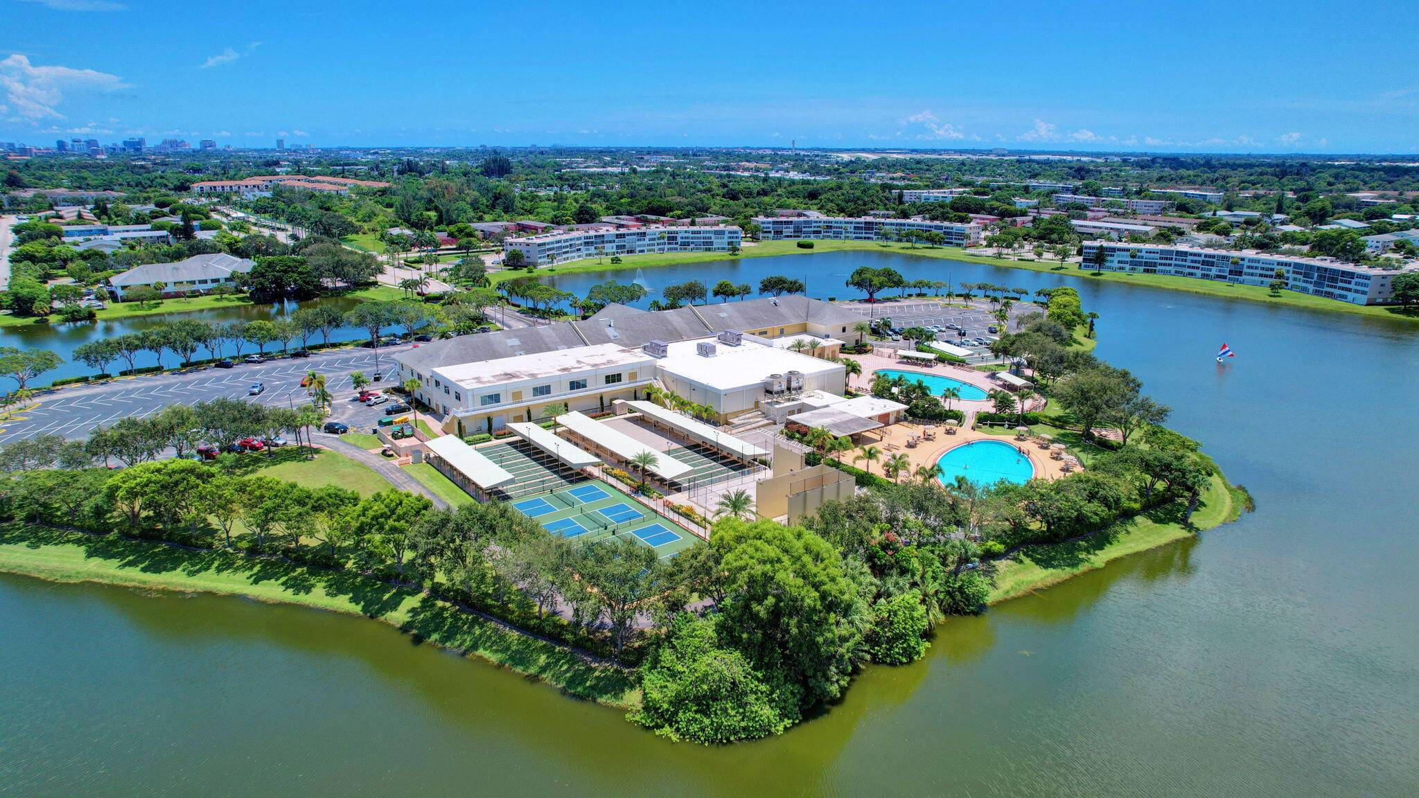 Priced to move, this ground floor 1 1 at Century Village also offers consistent flooring an assigned parking spot directly in front of the entrance.