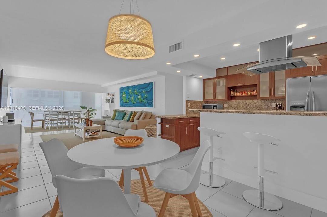 Oversized unit with enclosed wraparound balcony offering 1, 505 sqft of living space.