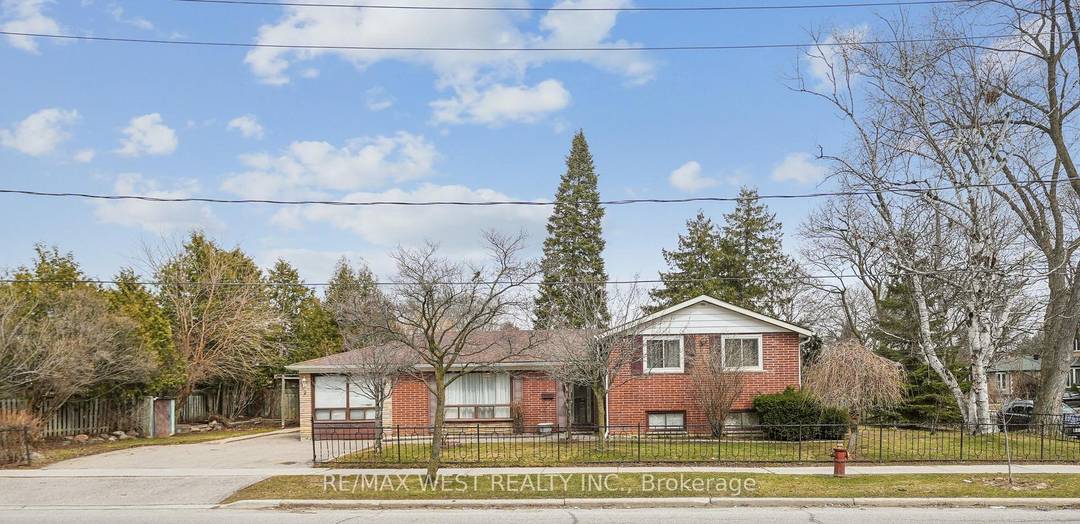 Welcome to 2 Lisburn Crescent, an extra wide corner lot offering abundant outdoor space.