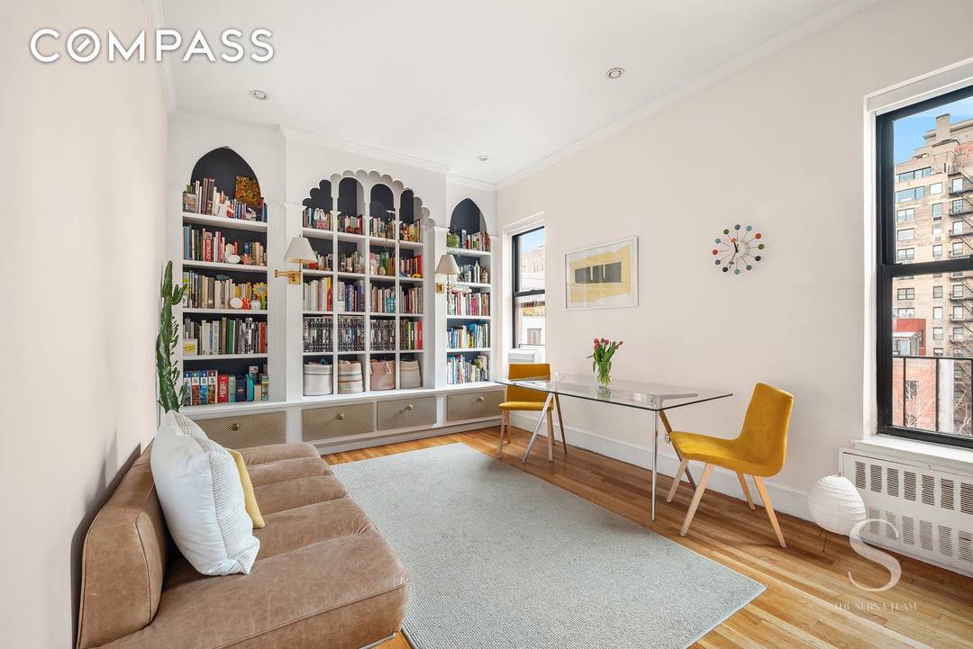 Sun Filled Pre War Perfection with Iconic City Views 1 block from Central Park !