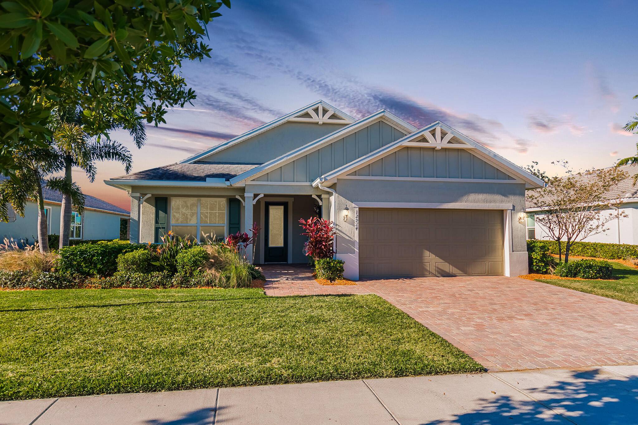 Welcome to this exquisite former model home, lakefront 2 2 2 w flex room in DelWebb 55 gated community.