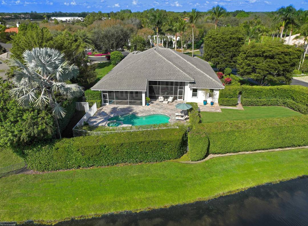 Stunning corner lot in The Equestrian Club Estates.