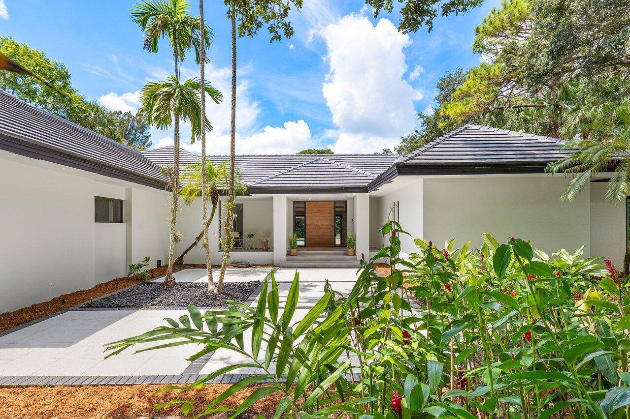 This fully reimagined contemporary gem is nestled in the prestigious Foxe Chase community, offering a perfect blend of modern luxury and serene privacy on over an acre of land.