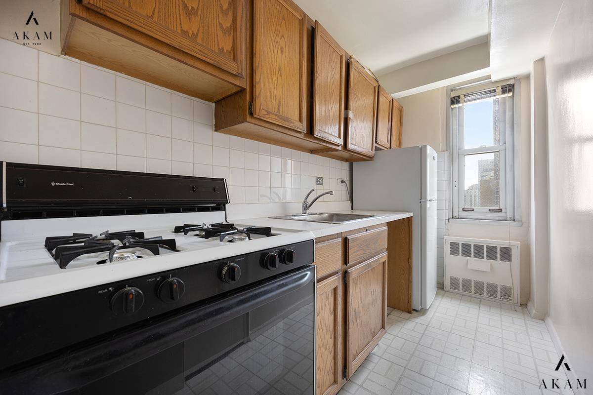 This massive, convertible two bedroom room requires complete renovation but offers enormous potential !