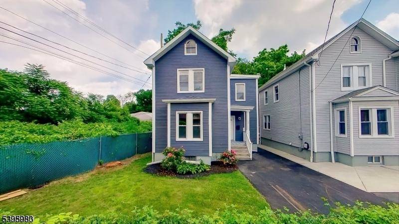 3 bedroom, 1. 5 bath Colonial in East Orange, just one block from Watsessing Park !