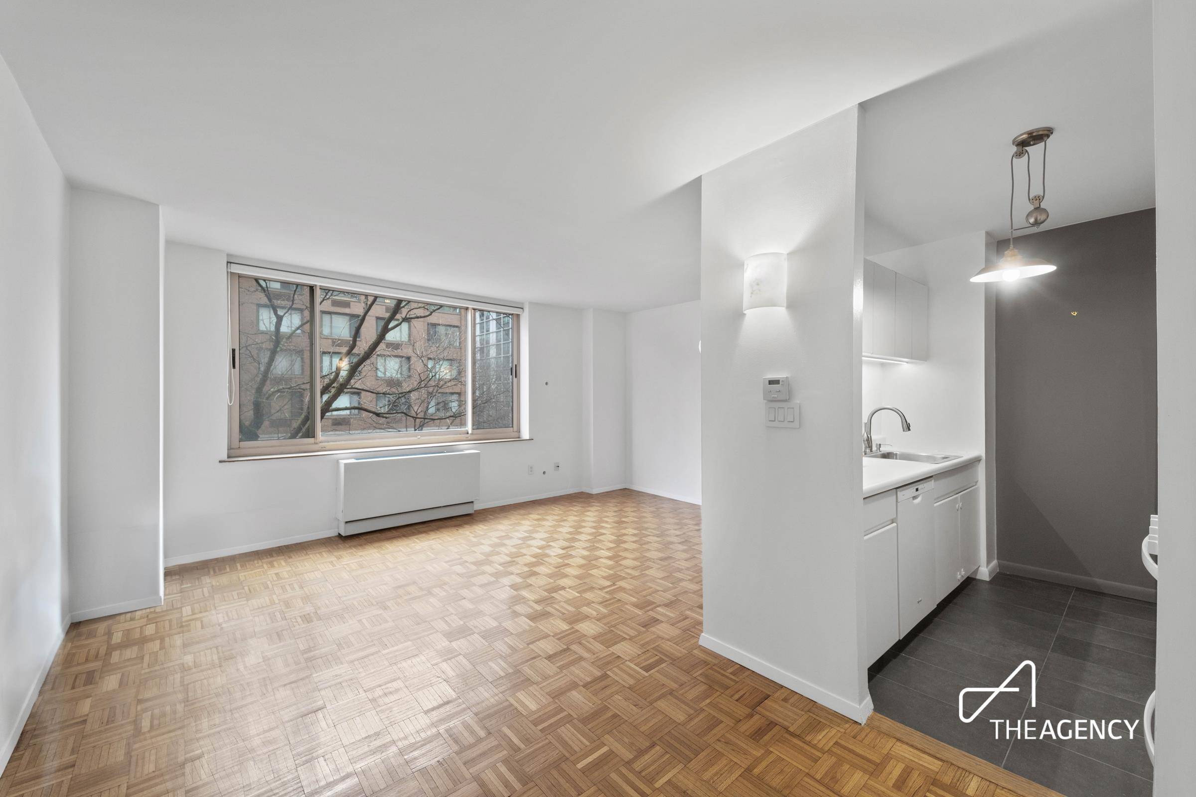 Apartment 3A is a charming move in ready one bedroom with a serene tree line view.