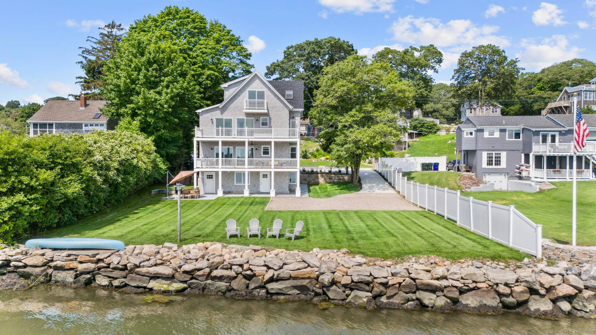 Welcome to this stunning, completely remodeled WATERFRONT two family home where no detail has been overlooked.