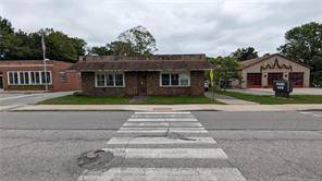 Charming commercial building situated downtown Moosup, between fire department and the post office with tons of potential.