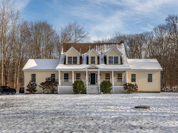 Welcome to this inviting Cape style home set on 18 acres at the end of a shared driveway in Washington, CT.