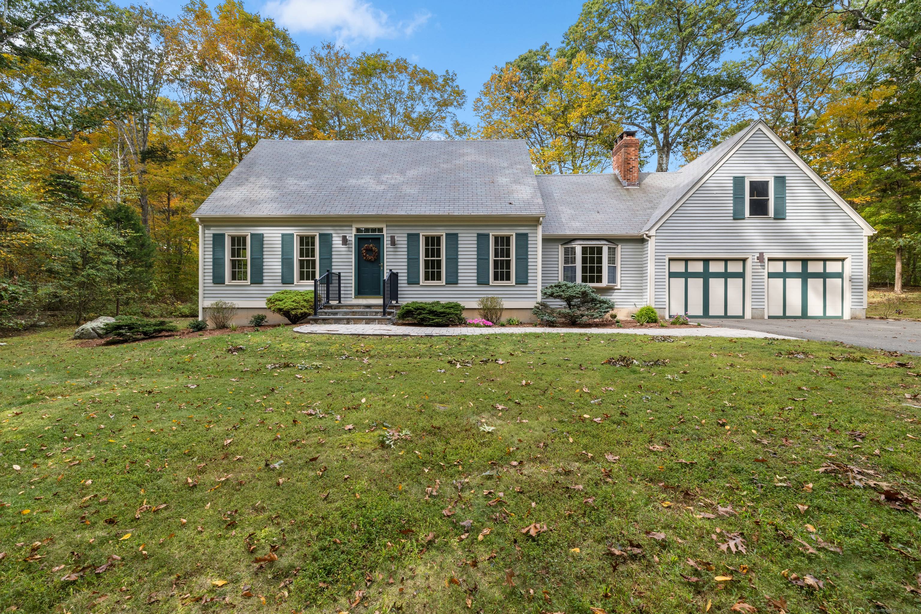 Welcome to 5 Foxhollow Road, a meticulously renovated 4 bedroom, 3 bath Cape located on a quiet cu de sac on 1.